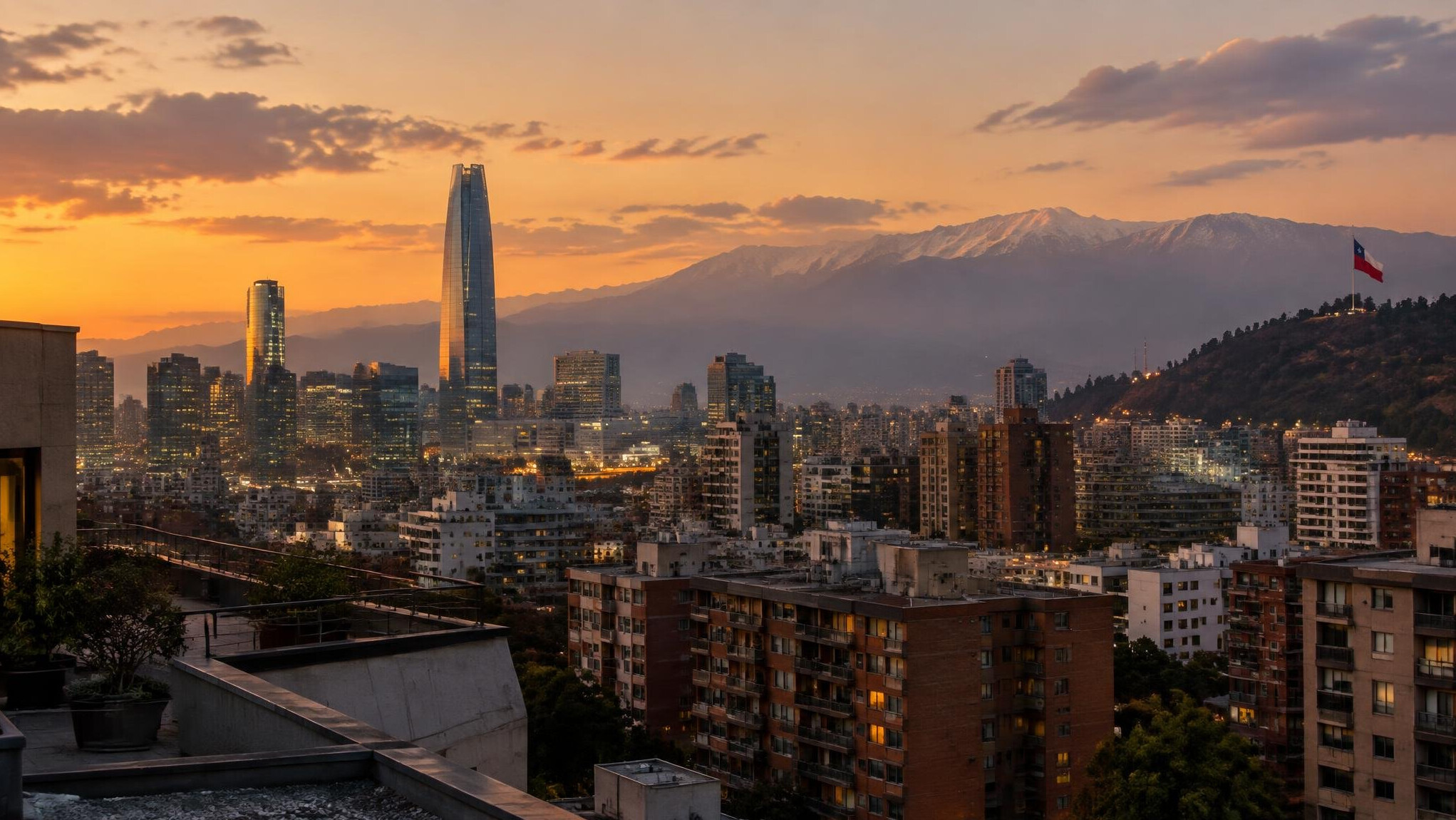 Rooftop view of a Chilean city skyline at dusk